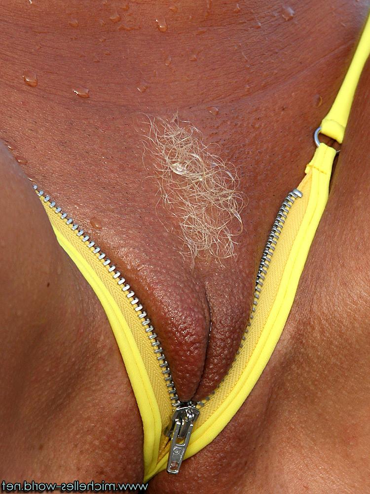 15P Tanned blonde with an incredible zip bikini
