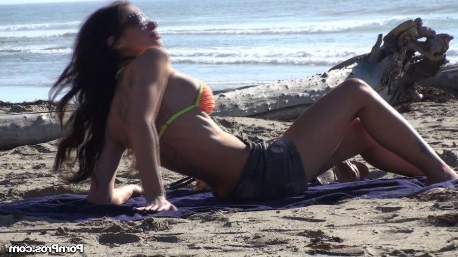 12P Busty beach beauty gets her bikini top stolen