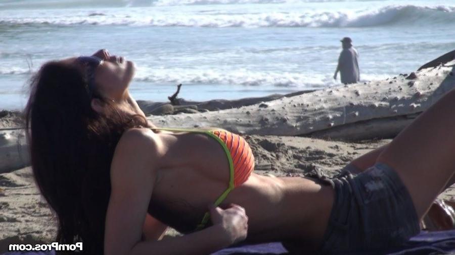 12P Busty beach beauty gets her bikini top stolen
