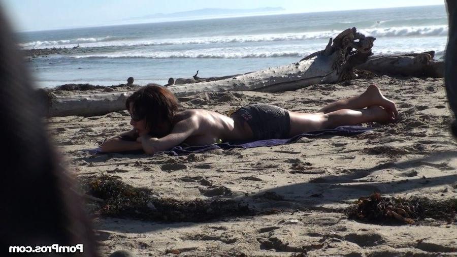 12P Busty beach beauty gets her bikini top stolen