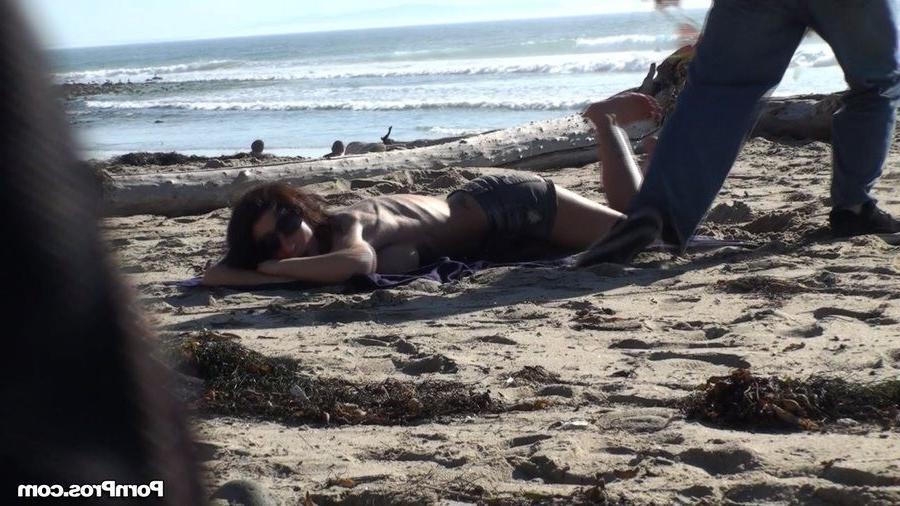 12P Busty beach beauty gets her bikini top stolen