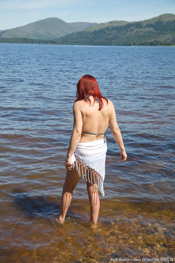 16P Mature redhead next door in a bikini at the lake