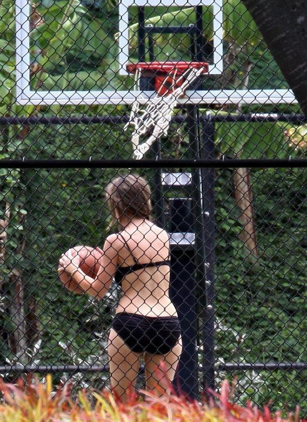15P Jennifer Love Hewitt playing tennis in the tiniest of bikinis