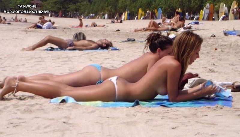 12P Sexy bikini girls getting suntanned bare titted