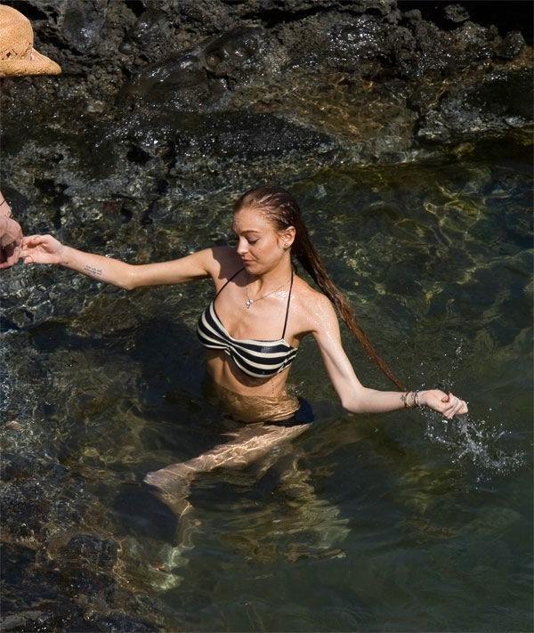 16P Lindsay Lohans big round boobs almost spill out of bikini