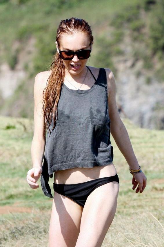 16P Lindsay Lohans big round boobs almost spill out of bikini
