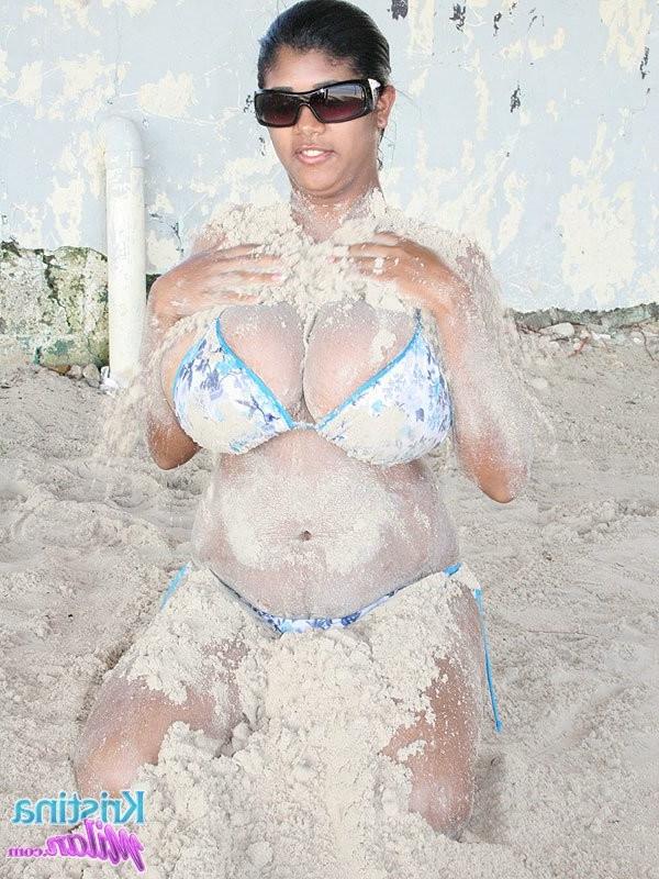 15P Giant boobed latina Kristina Milan in a bikini