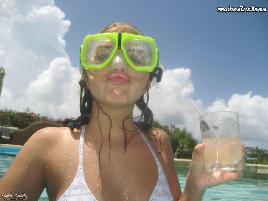 16P Kari Sweets in Puerto Rico enjoing some beer in a bikini
