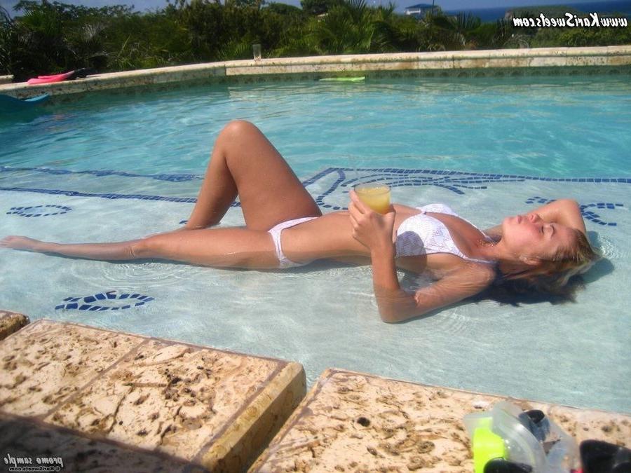 16P Kari Sweets in Puerto Rico enjoing some beer in a bikini