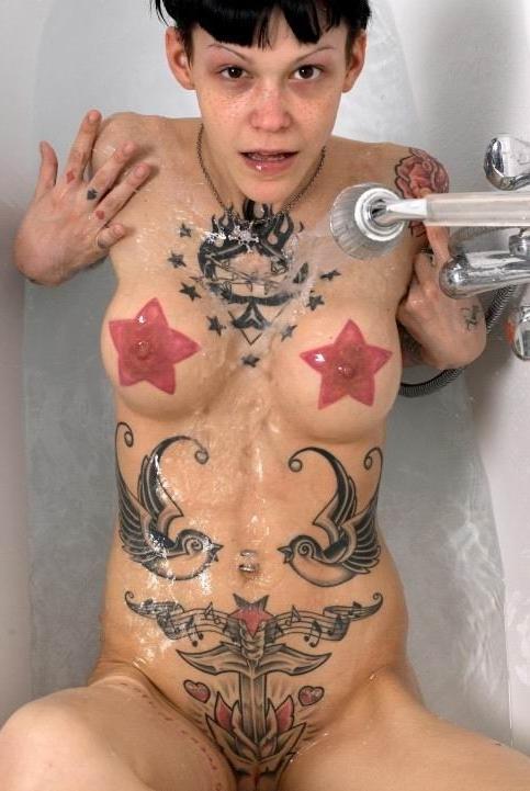15P Cute brunette tattoed teen posing in the bath