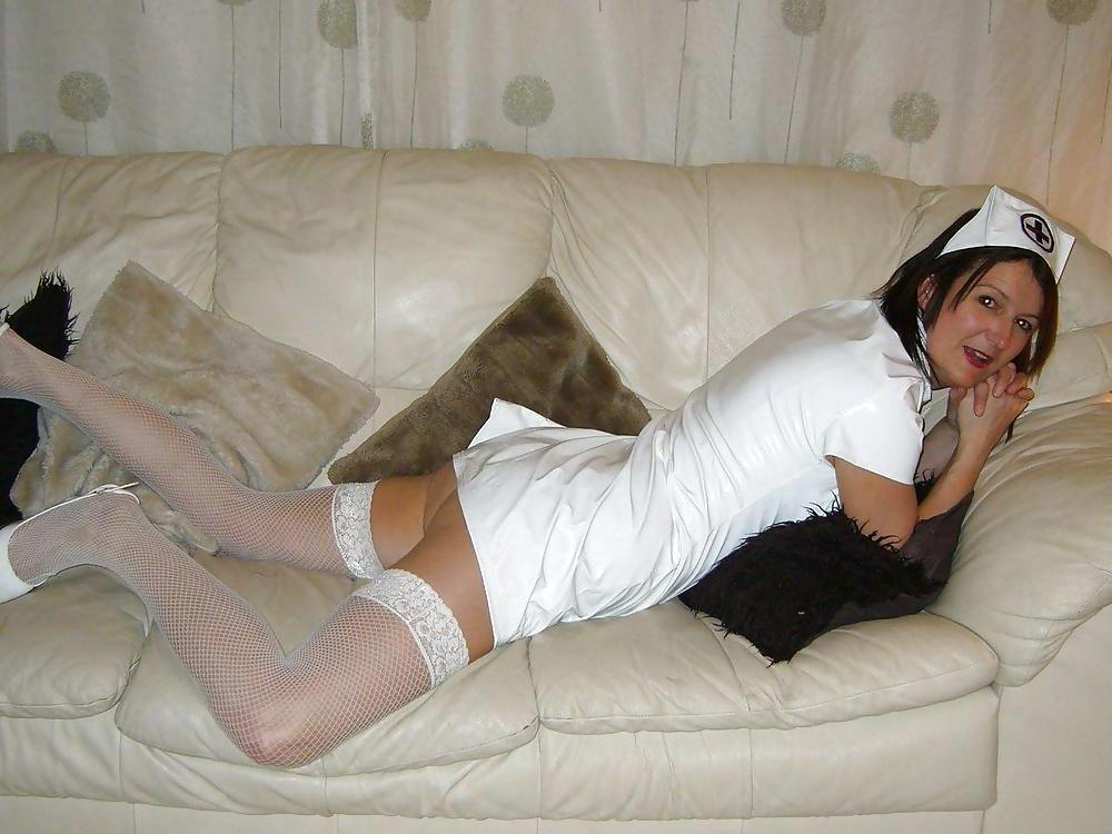 25P UK Milf in PVC Nurses Outfit 1