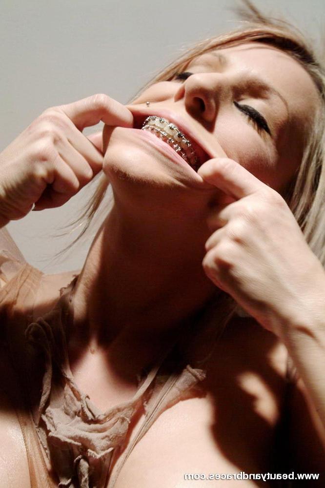 16P Blonde babe with big tits and braces hanging from her pantyhose