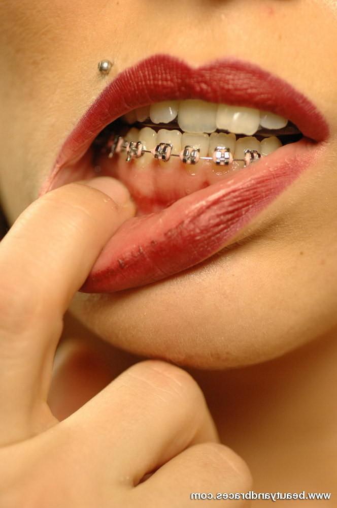 16P Hot blonde with braces takes of her vinyl bikini and spreads