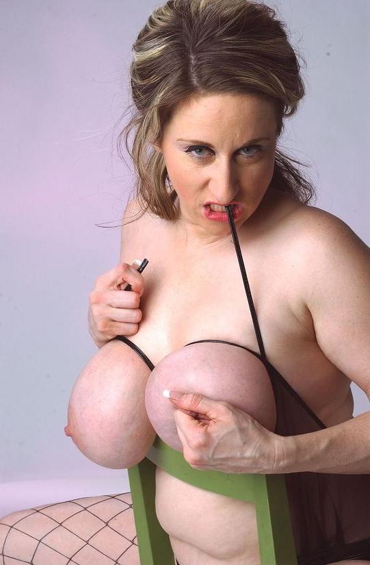 16P Big Titted Milf In Stockings Wanks With Her Dildo