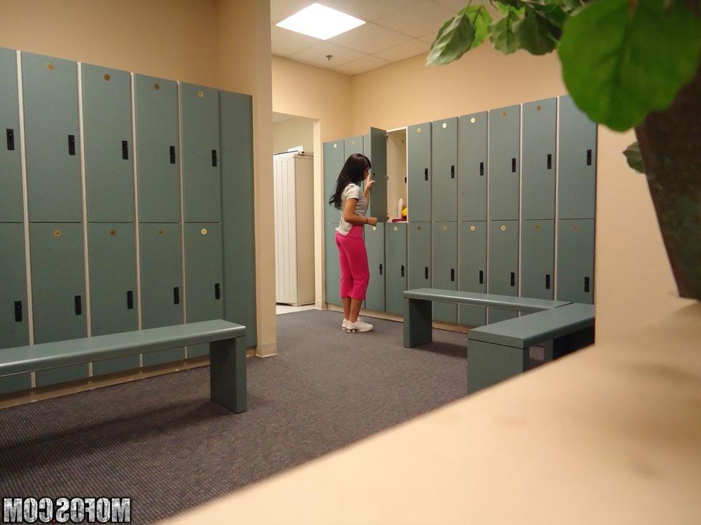 15P Nice young brunette fucking a voyeur in the locker room