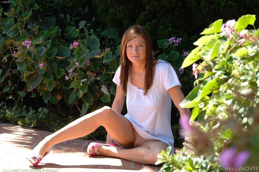 15P Young brunette with big pussy enjoying posing in the garden