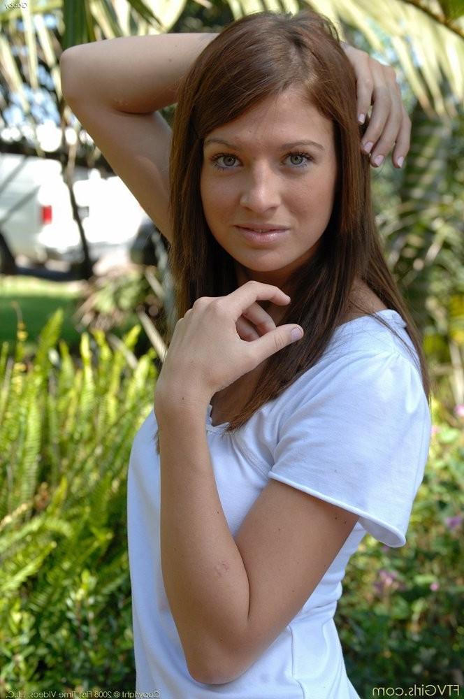 15P Young brunette with big pussy enjoying posing in the garden