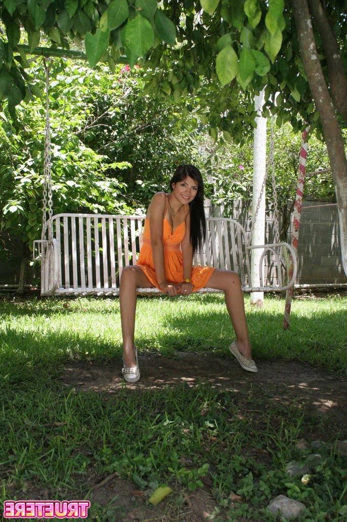 16P Teen girl in sundress outside