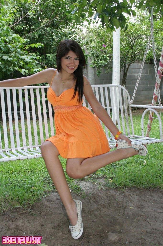 16P Teen girl in sundress outside