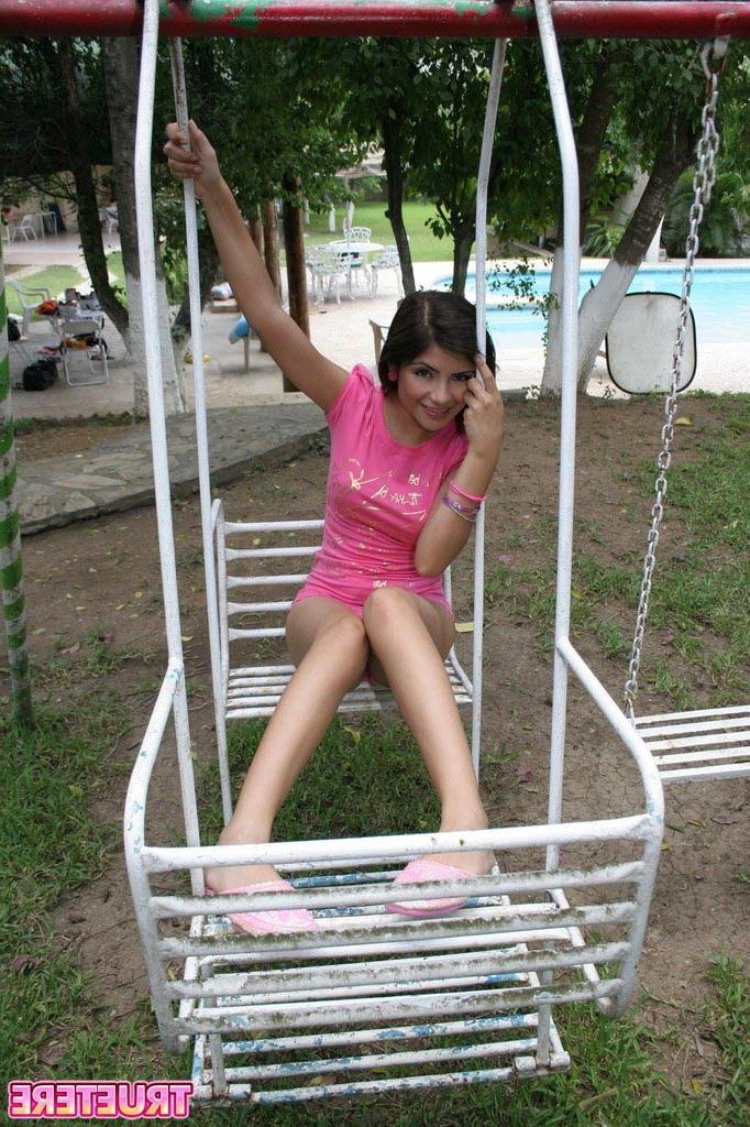 16P Teen girl swinging outside