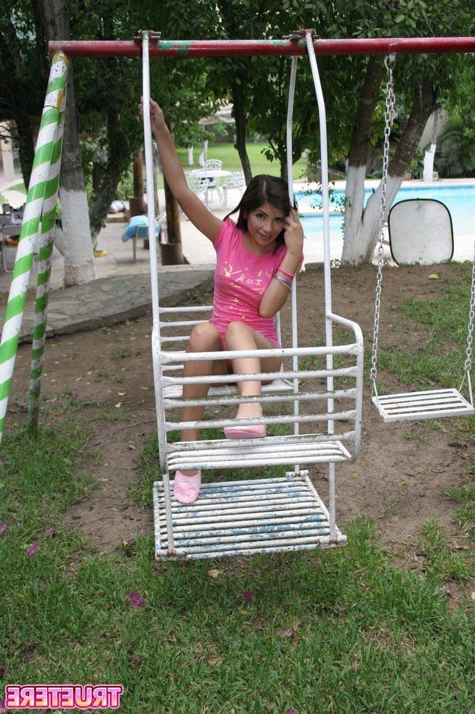 16P Teen girl swinging outside