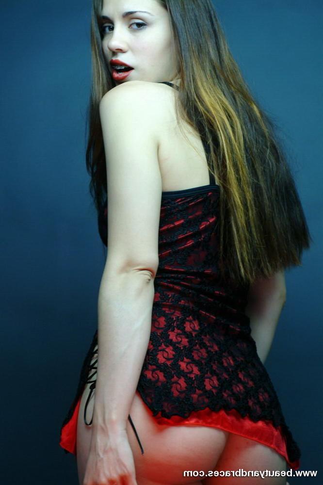 16P Cute brunette teen with braces stretches her mouth wide open