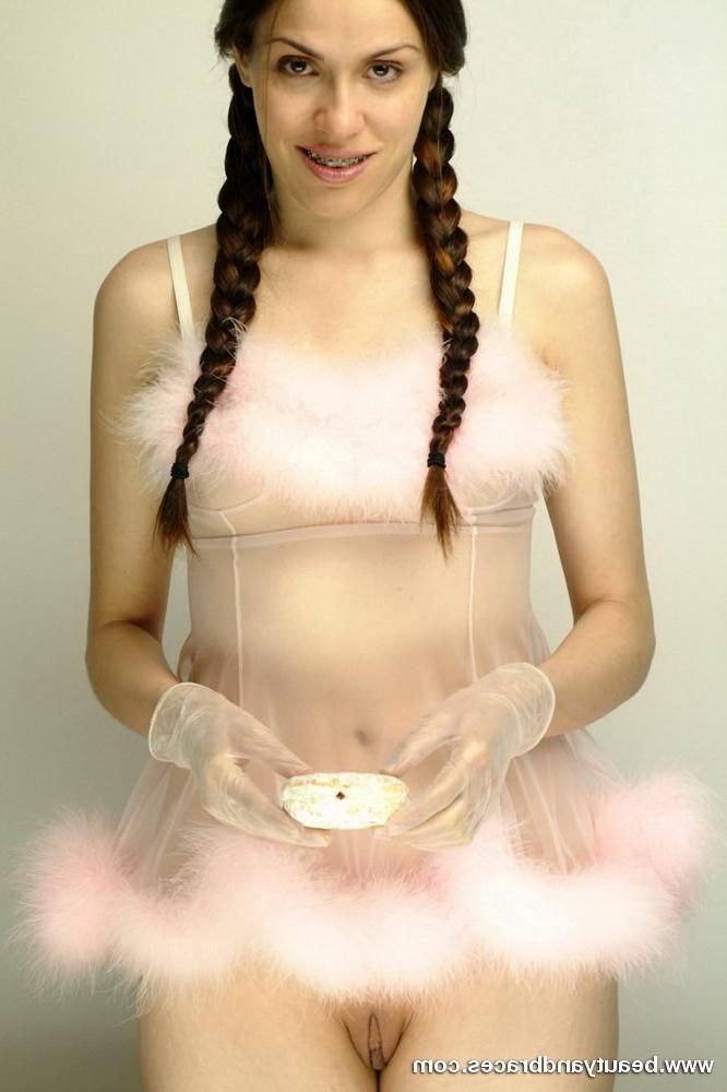 16P Pigtailed teen with braces stuffs a donut in her sexy mouth