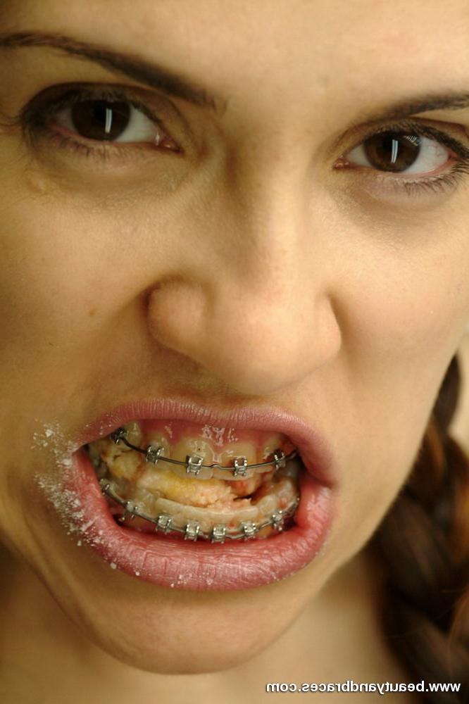 16P Pigtailed teen with braces stuffs a donut in her sexy mouth