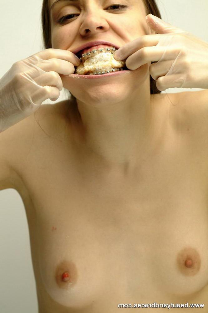 16P Pigtailed teen with braces stuffs a donut in her sexy mouth