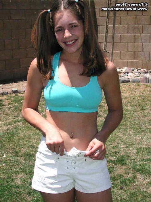 20P Brunette teen plays with a hula hoop