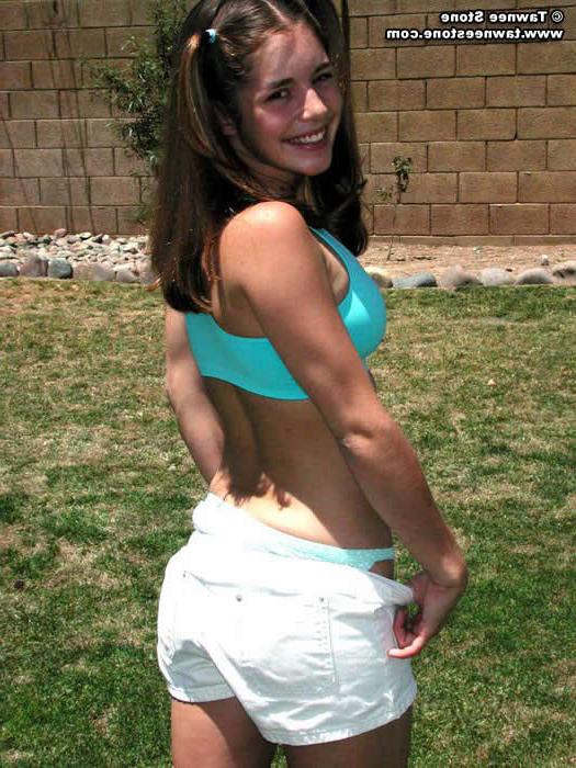 20P Brunette teen plays with a hula hoop