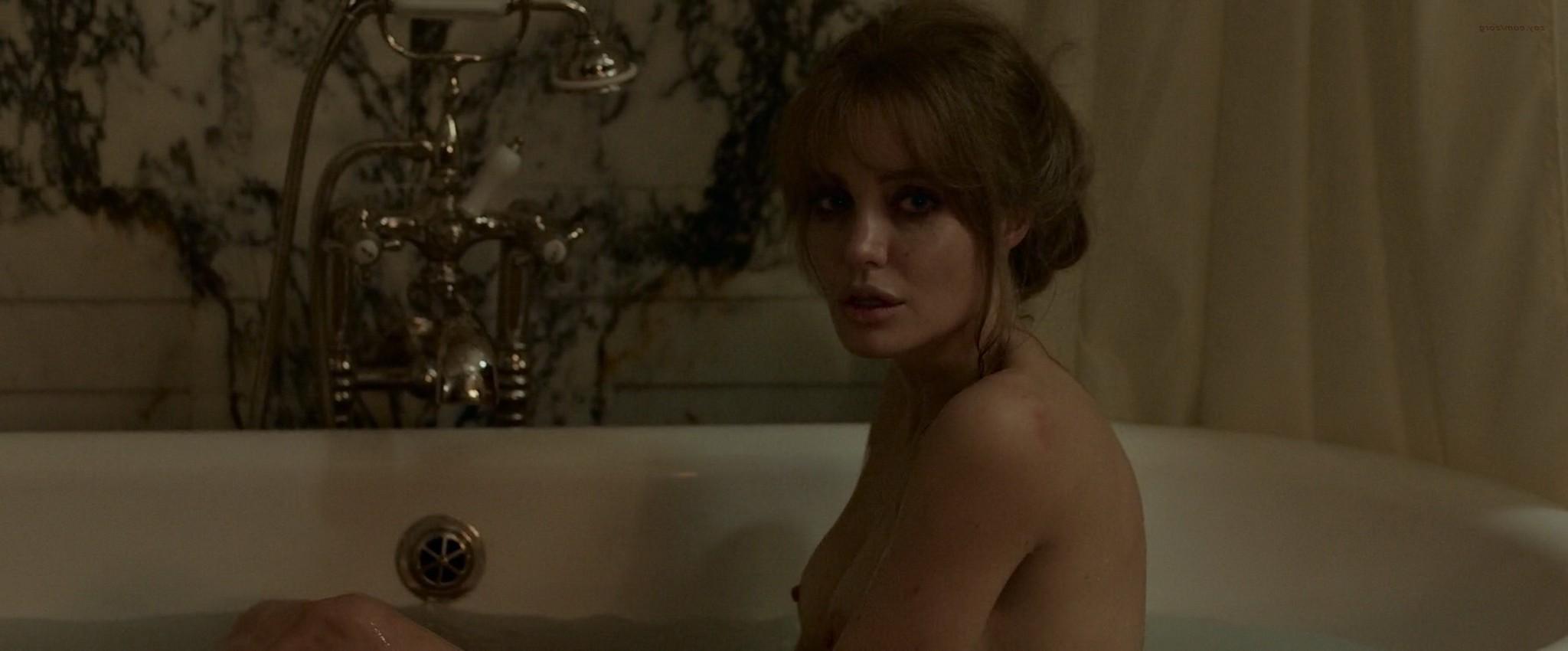 16P Angelina Jolie topless in the bath having sex