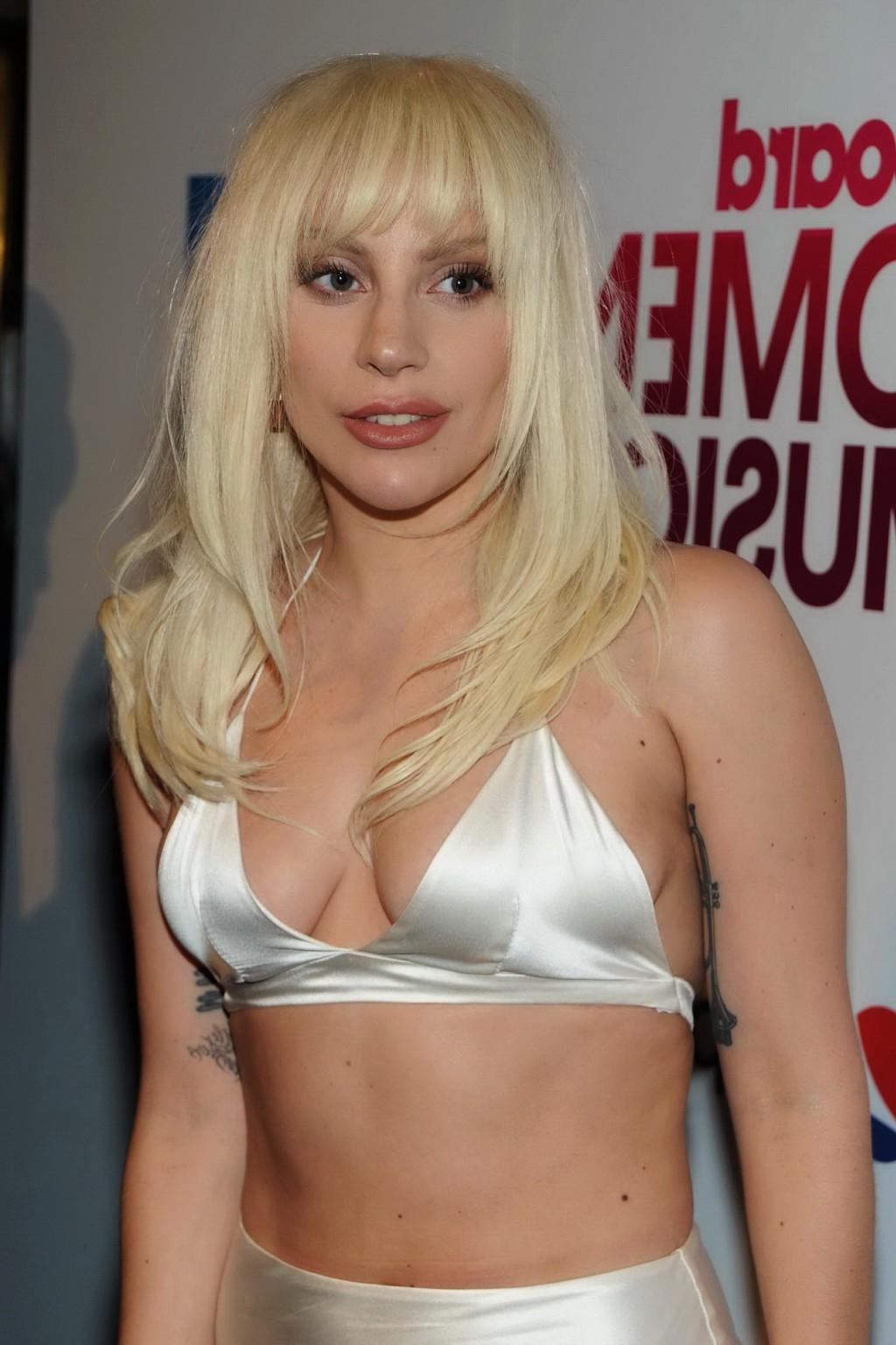 16P Lady Gaga busty in tiny white bra and skirt in public