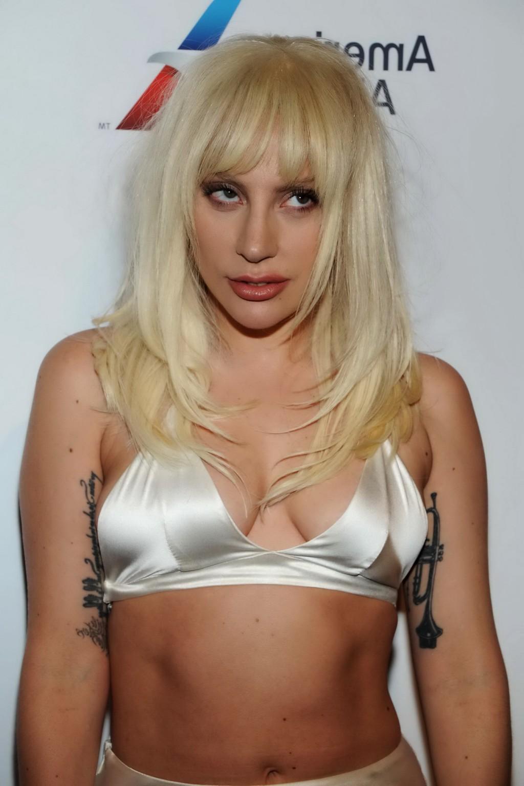 16P Lady Gaga busty in tiny white bra and skirt in public