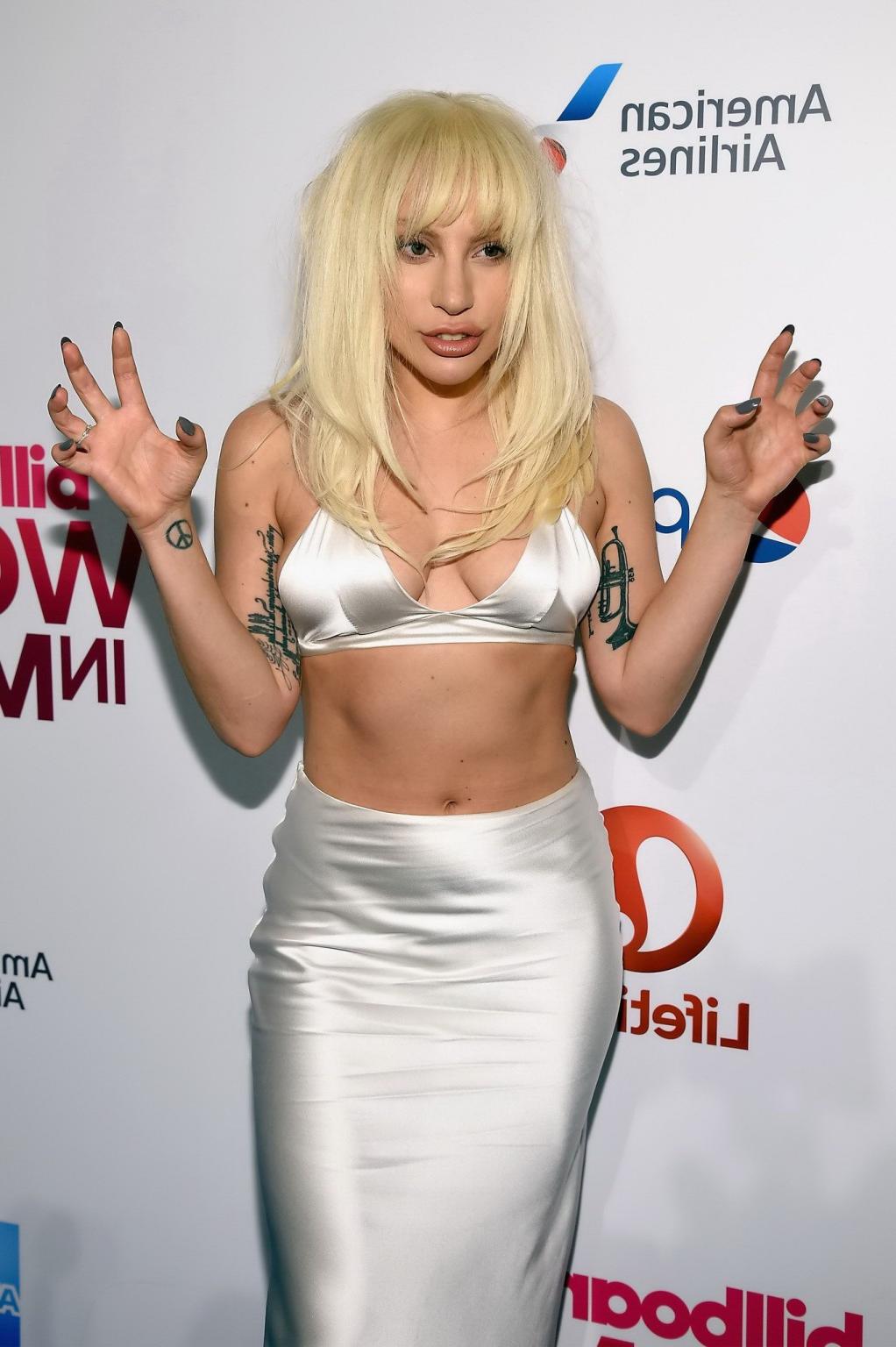 16P Lady Gaga busty in tiny white bra and skirt in public