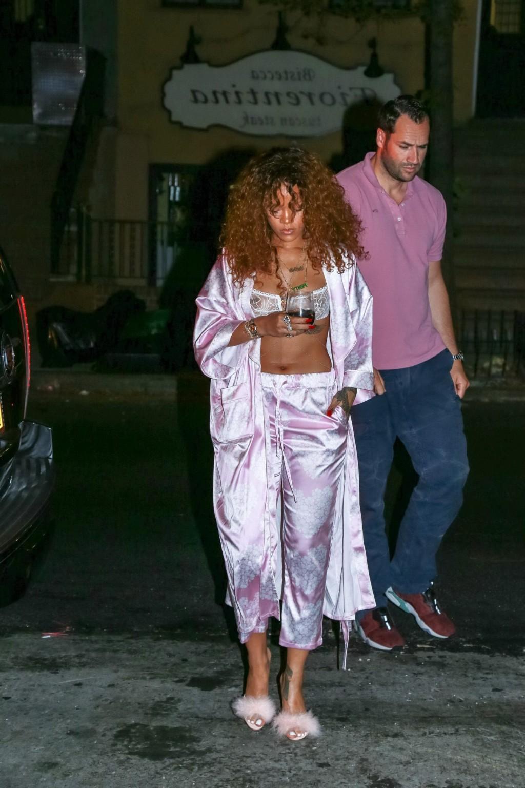 16P Rihanna shows off her boobs in a see through bra out in NYC