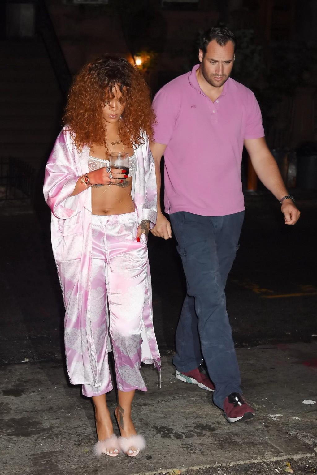 16P Rihanna shows off her boobs in a see through bra out in NYC