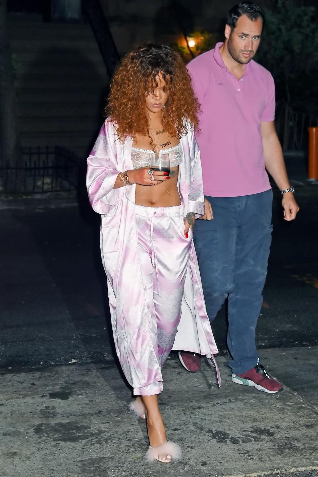 16P Rihanna shows off her boobs in a see through bra out in NYC