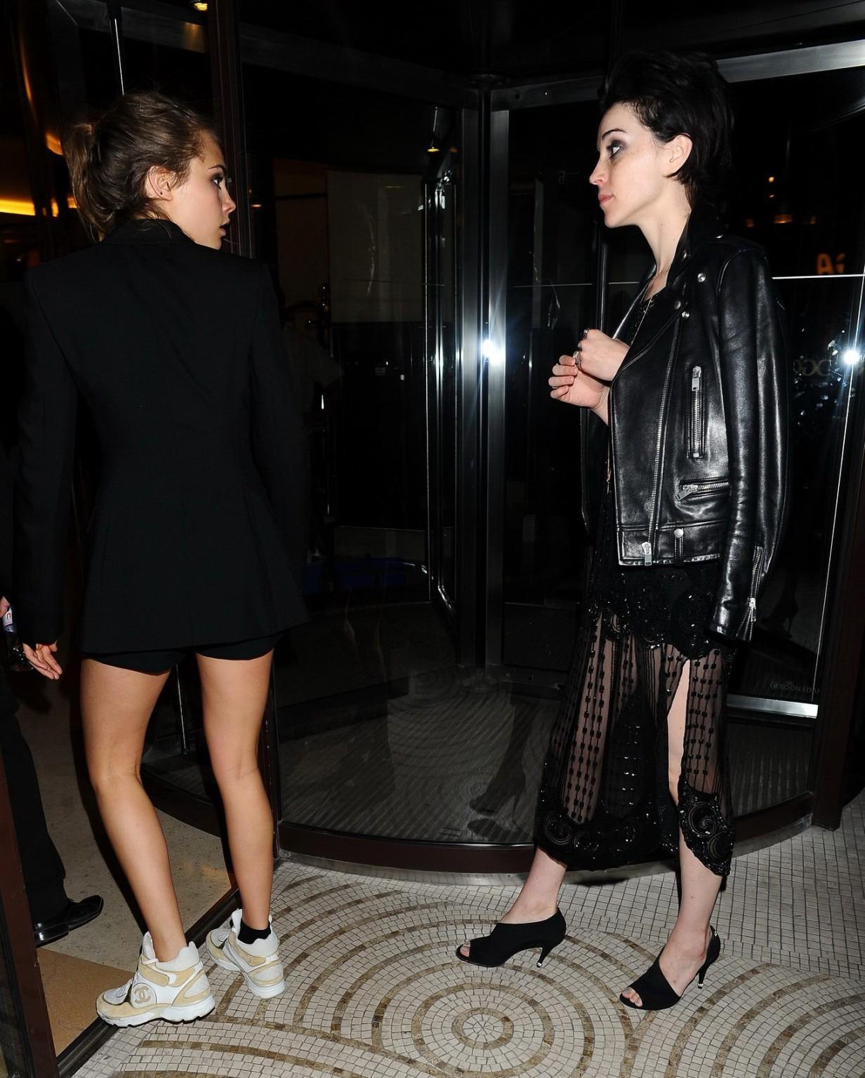 16P Cara Delevingne bra peek at the Gotham Nightclub in Cannes