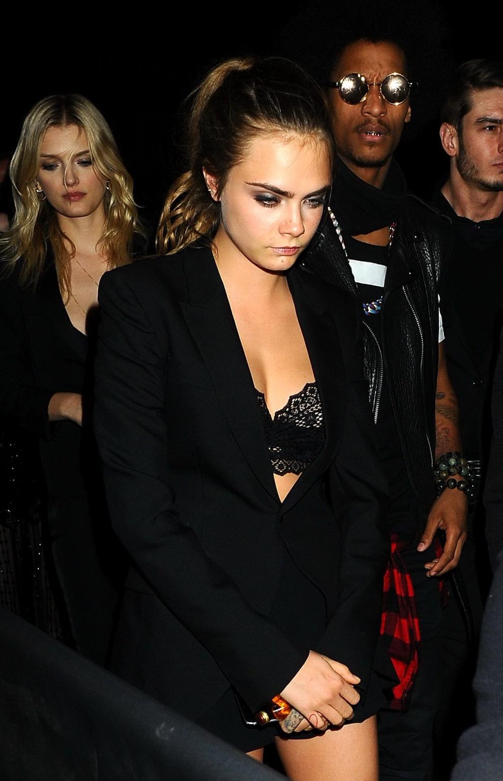 16P Cara Delevingne bra peek at the Gotham Nightclub in Cannes