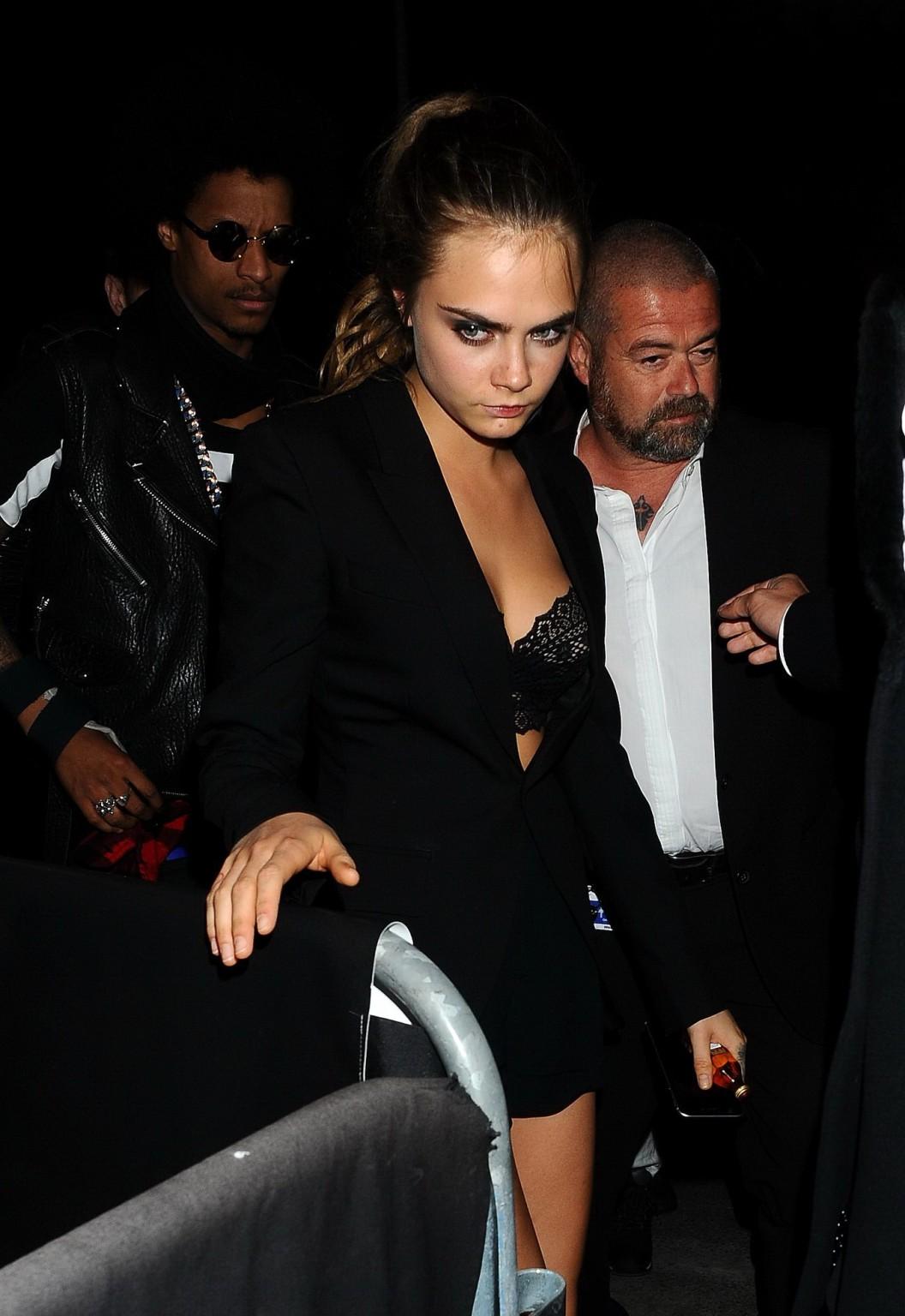 16P Cara Delevingne bra peek at the Gotham Nightclub in Cannes