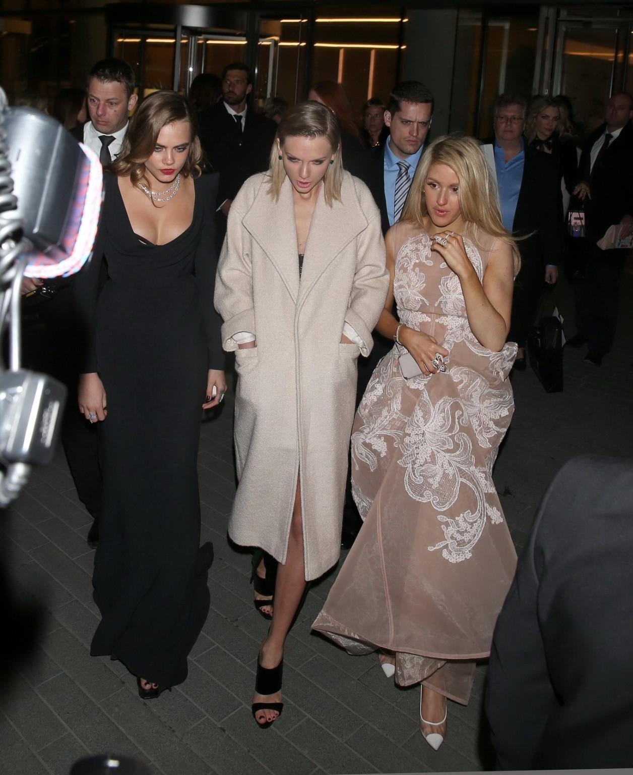 16P Cara Delevingne bra peek wearing a low cut dress at the Elle Style Awards in Lon
