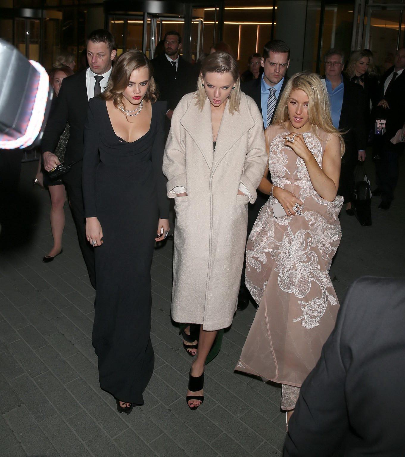 16P Cara Delevingne bra peek wearing a low cut dress at the Elle Style Awards in Lon