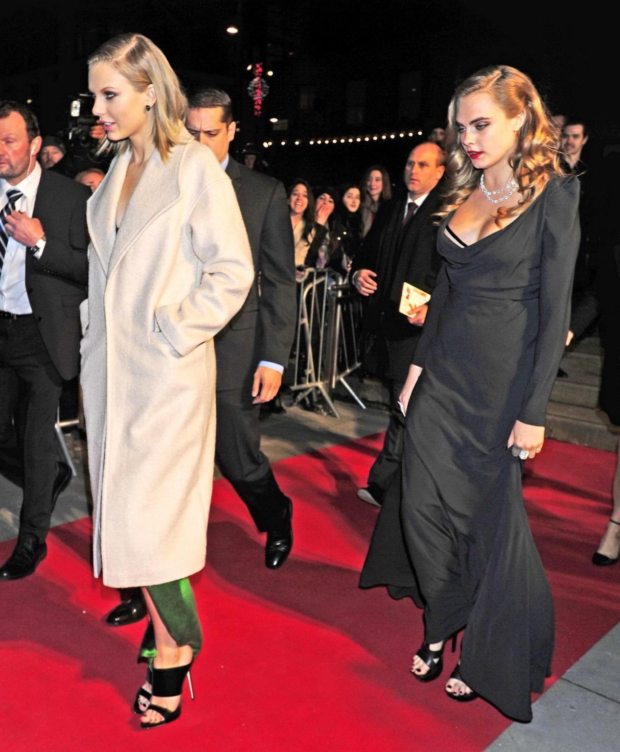 16P Cara Delevingne bra peek wearing a low cut dress at the Elle Style Awards in Lon