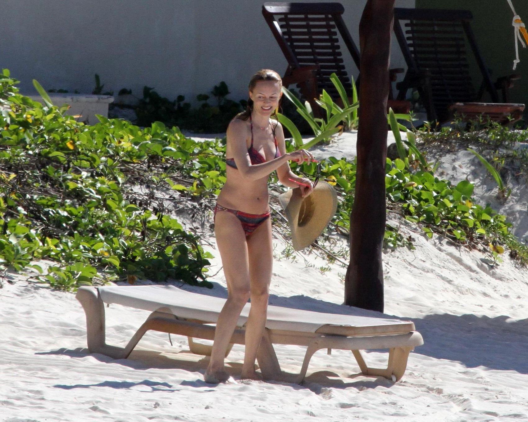 16P Heather Graham showing off her bikini body on a Mexican beach