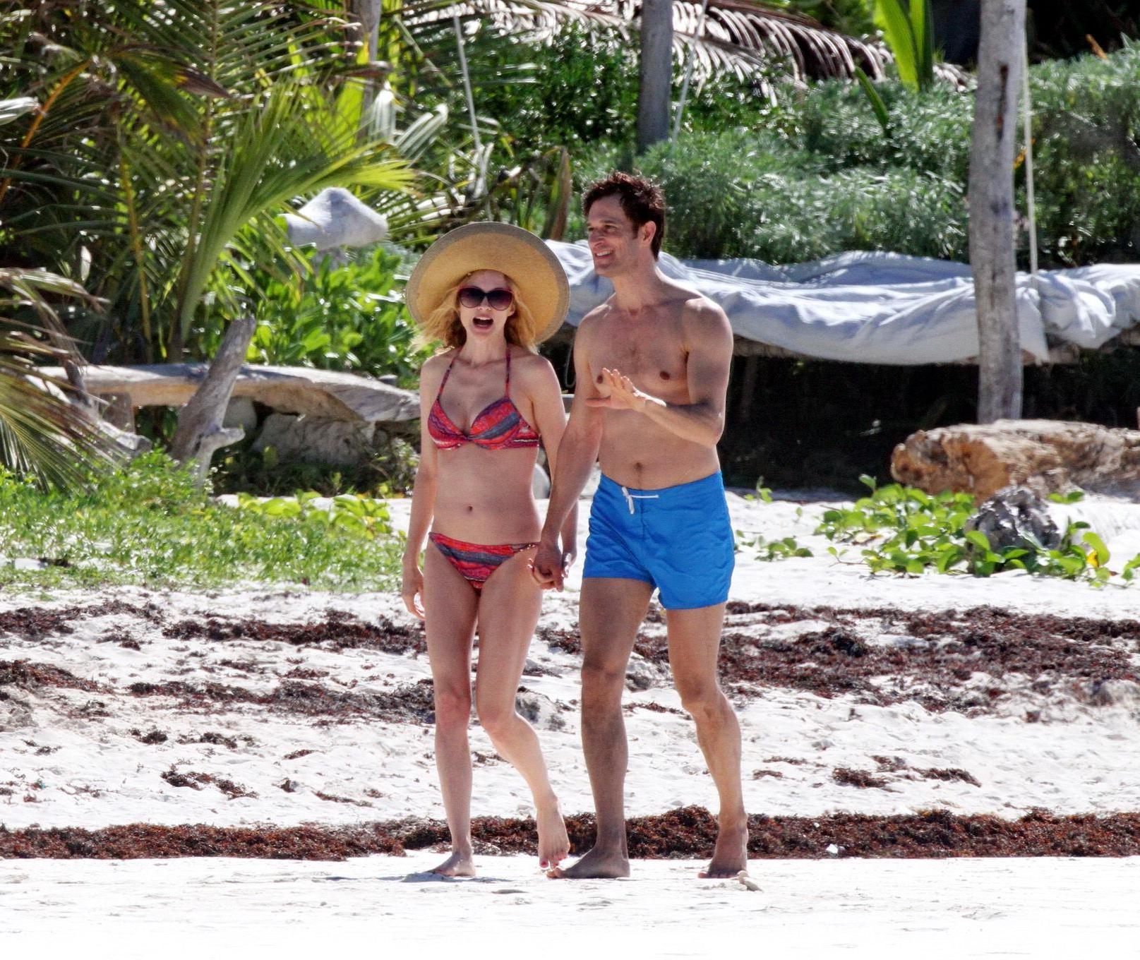 16P Heather Graham showing off her bikini body on a Mexican beach