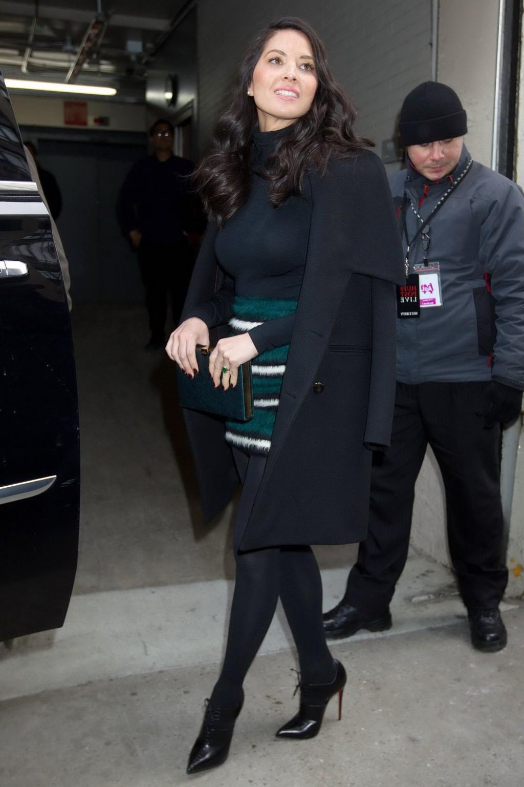 16P Olivia Munn seethru to bra and leggy in mini skirt and pantyhose at AOLs BUILD S