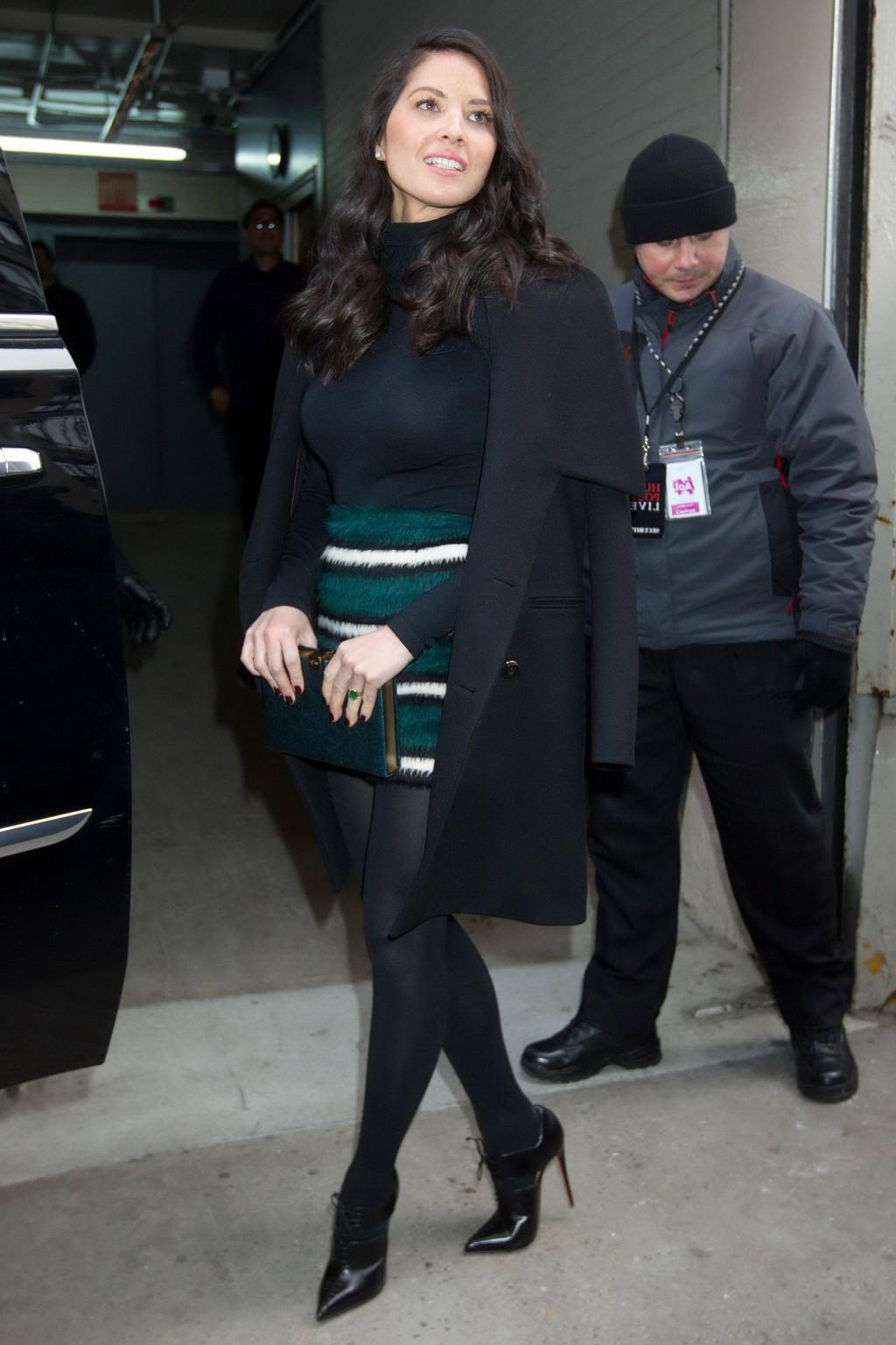 16P Olivia Munn seethru to bra and leggy in mini skirt and pantyhose at AOLs BUILD S