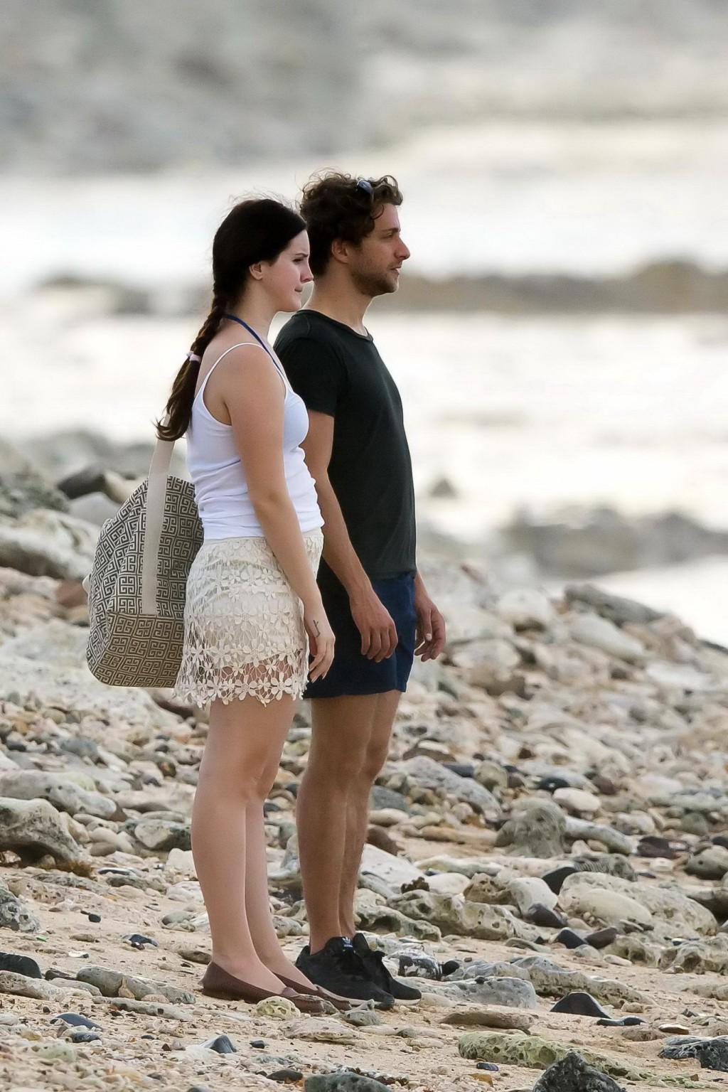 16P Lana Del Rey wearing blue bikini under the cthru skirt  top on a beach in St Bar