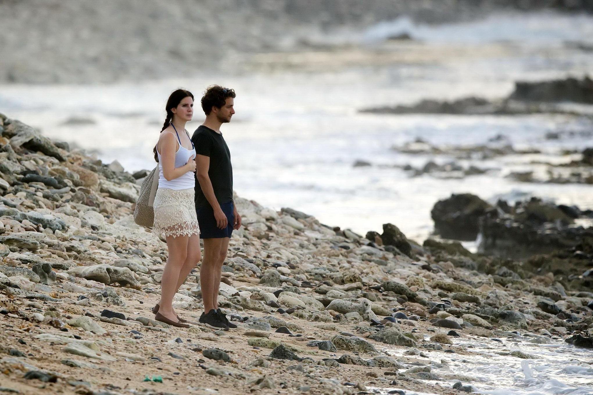 16P Lana Del Rey wearing blue bikini under the cthru skirt  top on a beach in St Bar